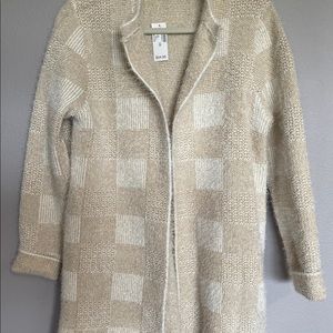 Lovely tunic length open sweater.